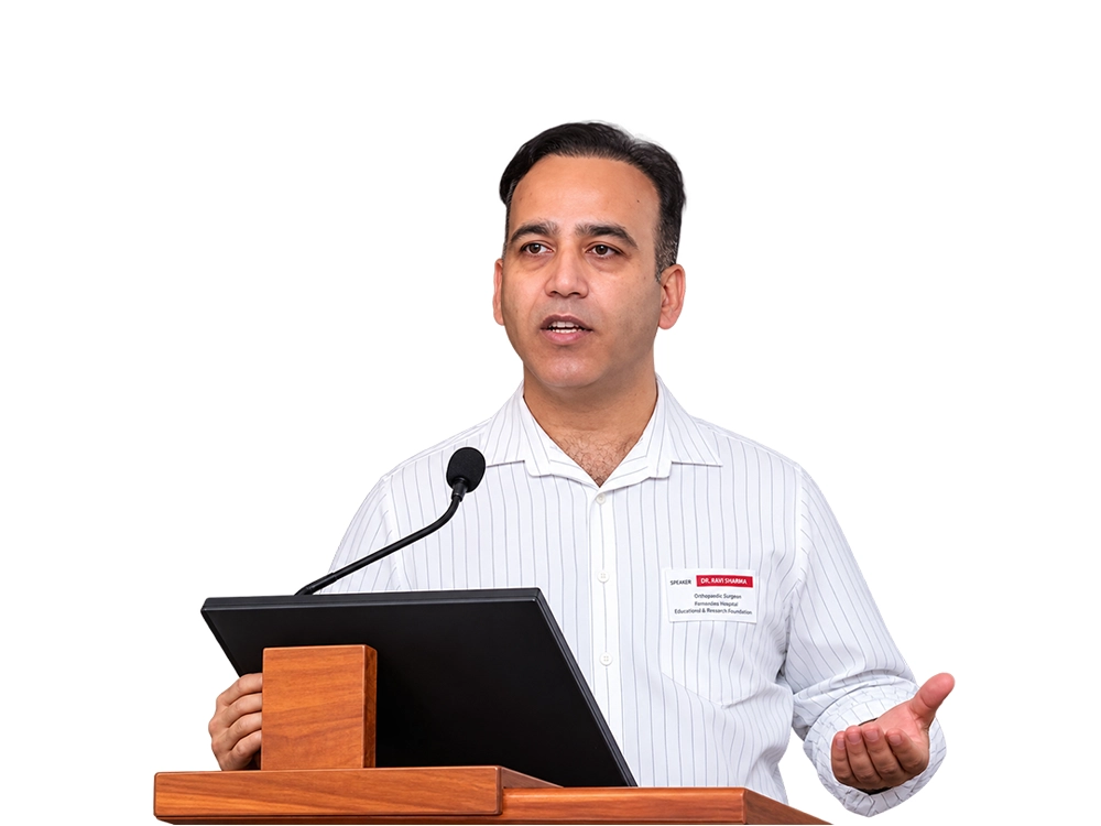 Dr. Asif Mehraj speaking from a lectern at a medical conference
