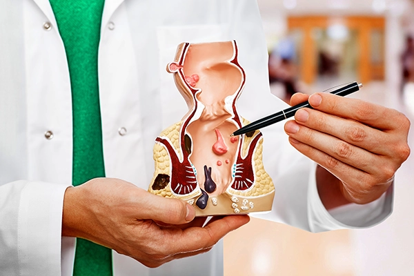 A patient reviewing her notes with a specialist at the clinic desk