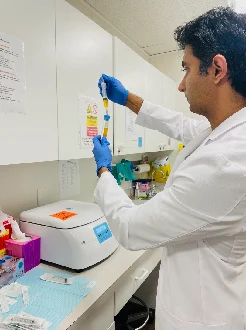 Dr. Nikhil Shyam preparing platelet-rich plasma in the practice lab