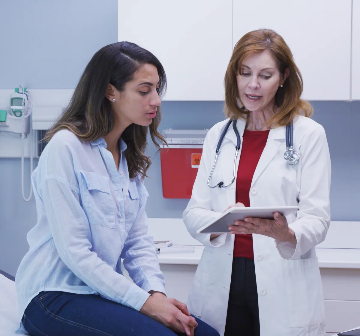 Patient having a skin growth evaluated during a dermatology appointment