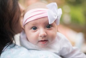 Infant in mother's arms