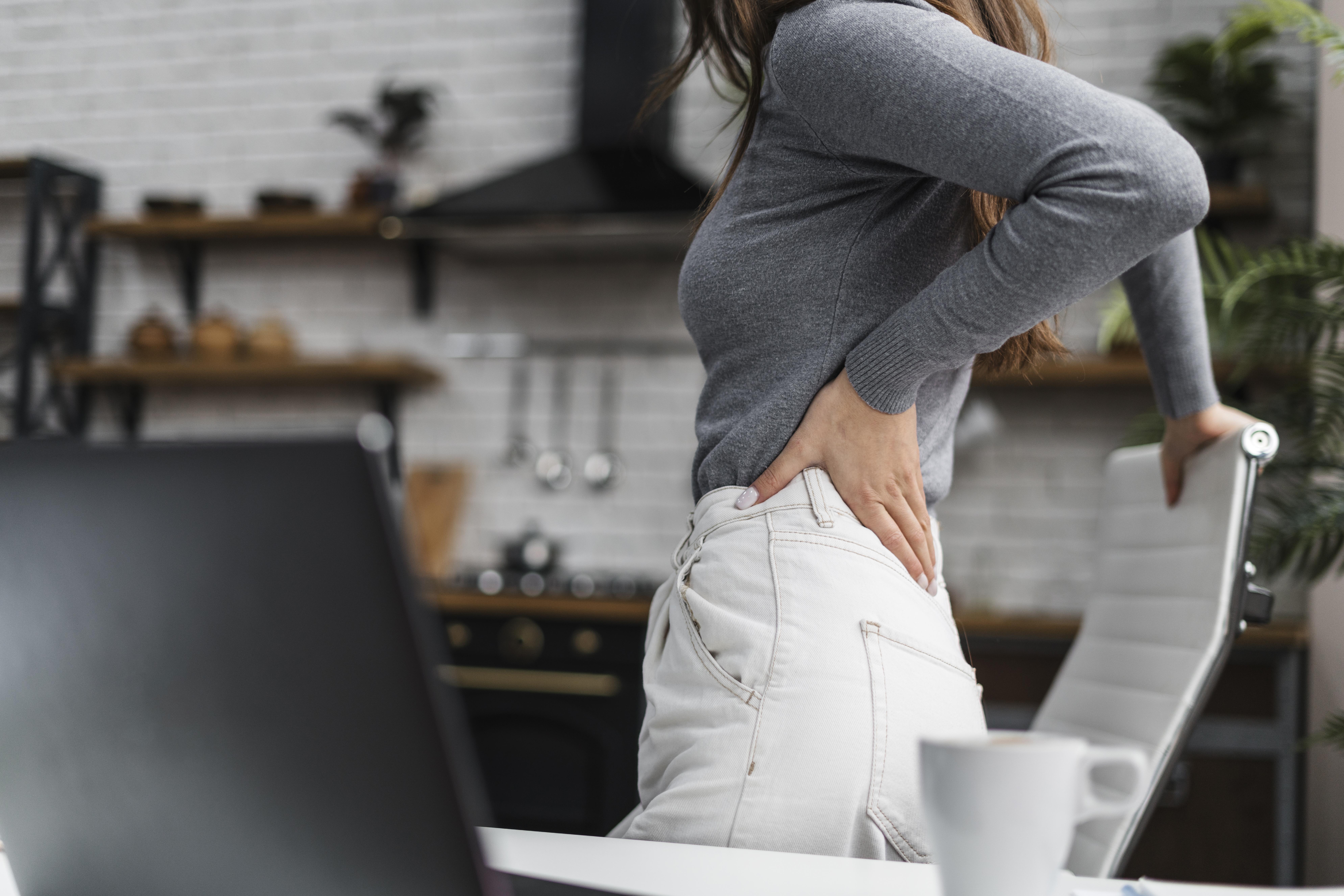 Patient experiencing hip pain caused by a herniated disc