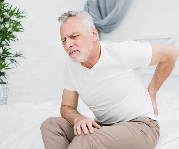 What Is the Primary Symptom of Lumbar Radiculopathy?