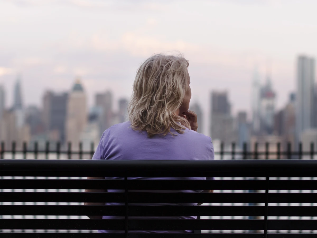 Woman on a relaxed secure video appointment from a quiet room at home