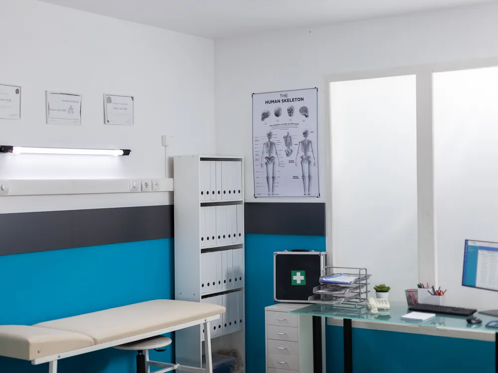Clinic room equipped for urology evaluation