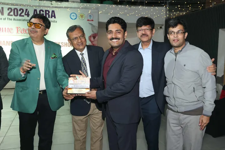 Dr. Kapoor felicitated on stage by senior surgeons at ASICON 2024, Agra