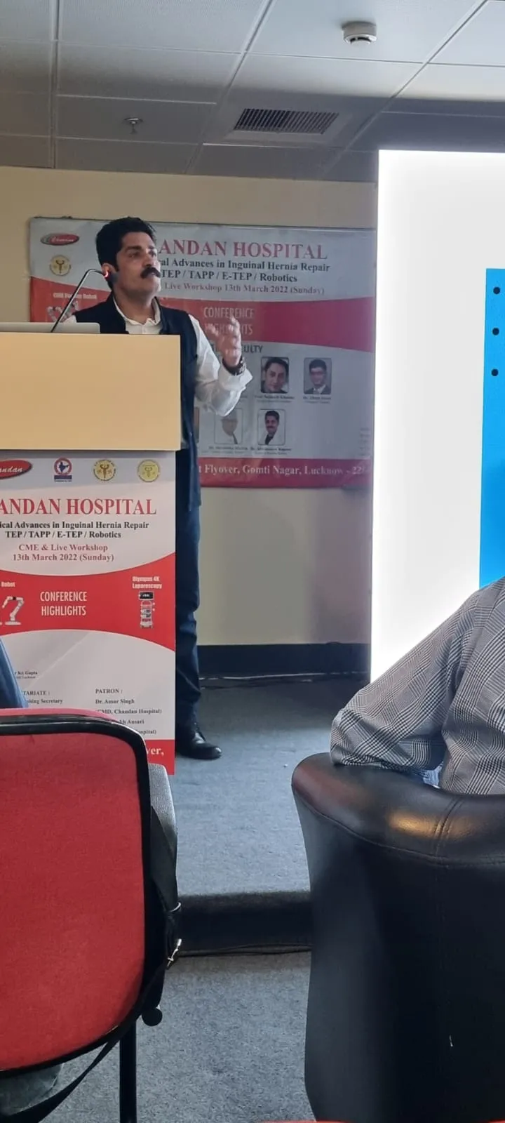Dr. Kapoor's talk on screen at a hospital CME