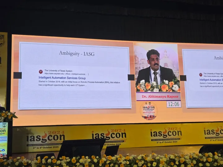 Dr. Kapoor's presentation on screen at IASGCON 2024