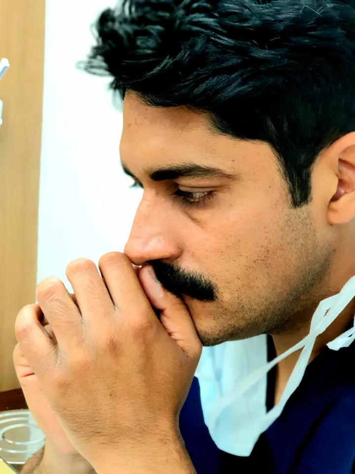 Dr. Kapoor in a thoughtful moment