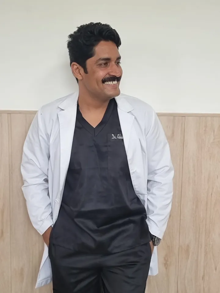 Dr. Abhimanyu Kapoor in his white coat