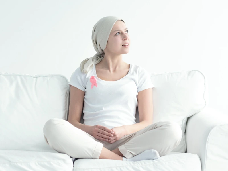 Surgeon discussing breast cancer surgery options with a patient