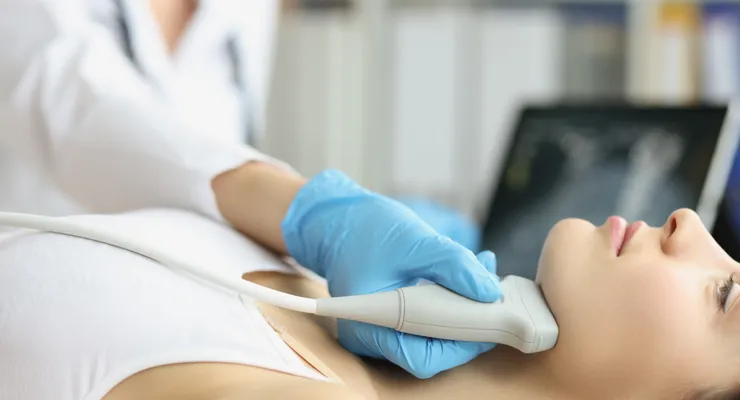 Thyroid ultrasound examination at the clinic