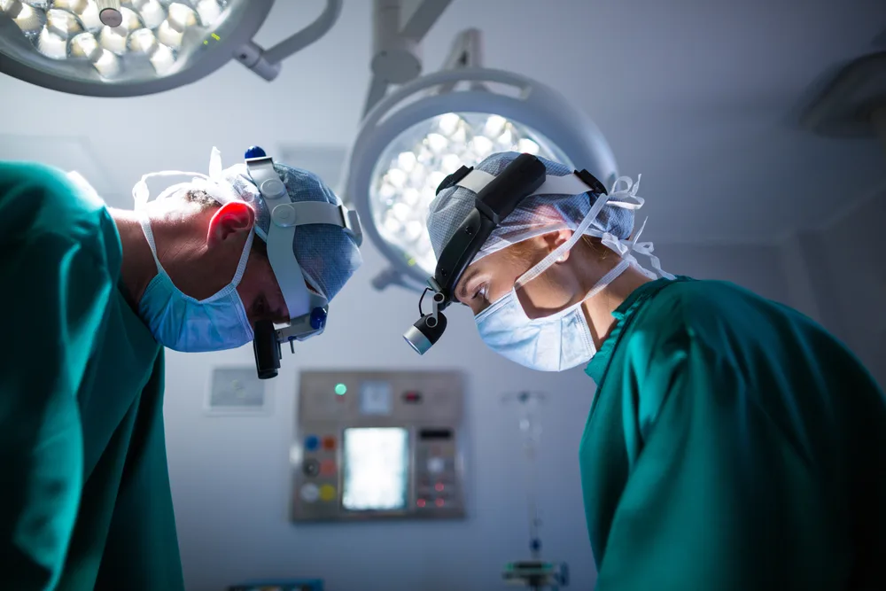 Breast surgery being performed by a surgical team