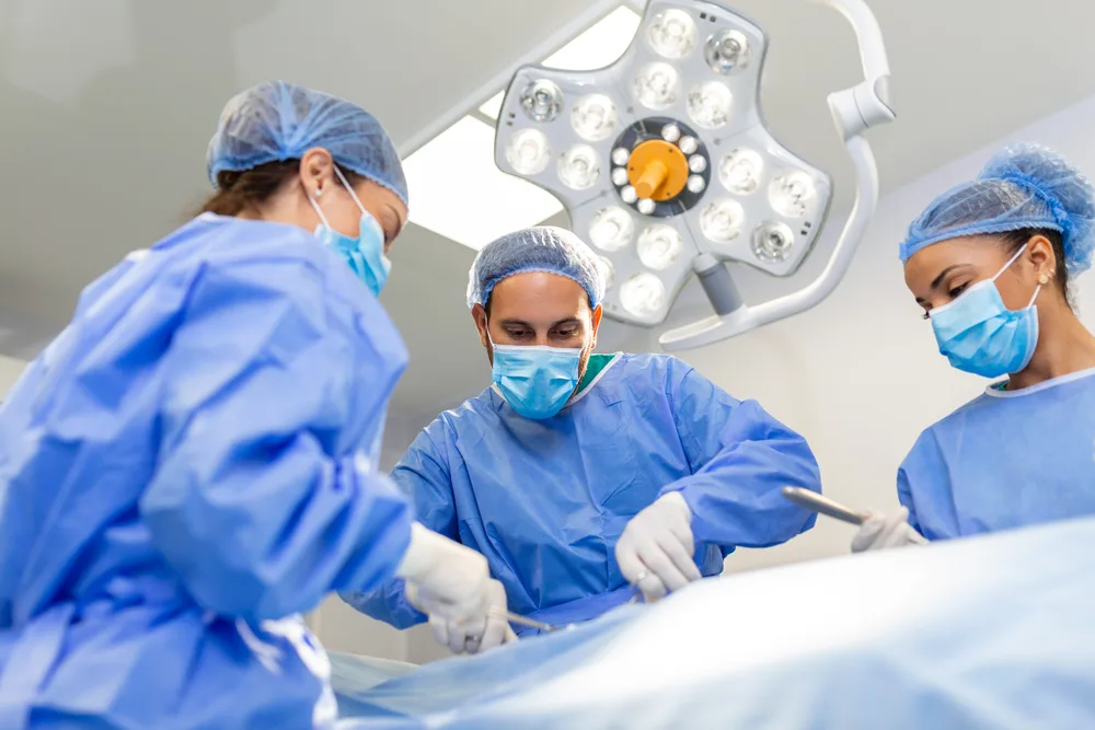 Thyroid surgery being performed in an operating theatre